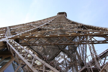 detail photograph of iron and rivets of the metal structure of the eiffel tower