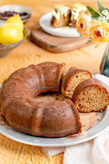 Healthy cake, flavor, moist and satisfying, lemon and chocolate chips cake made with whole wheat flour, flower concept food photo selective focus