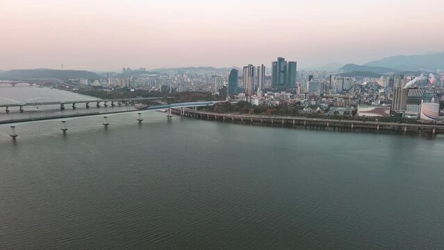 Seoul: Aerial view of capital city of South Korea, skyline of Hapjeong-dong with modern buildings (skyscrapers) at sunset, tree foliage in autumn colors - landscape panorama of East Asia from above