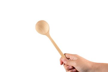 Hand and wooden spoon isolated on transparent background
