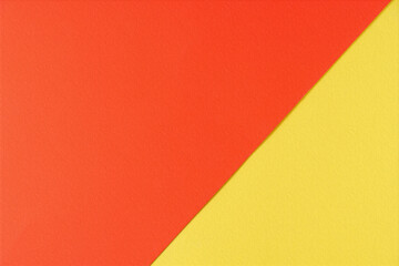 Background of yellow and red paper in bright colors, geometric pattern.