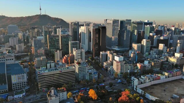 Seoul: Aerial view of capital city of South Korea, skyline with modern high-rise buildings (skyscrapers), sunrise in Jongno-gu | Jung-gu district - landscape panorama of East Asia from above