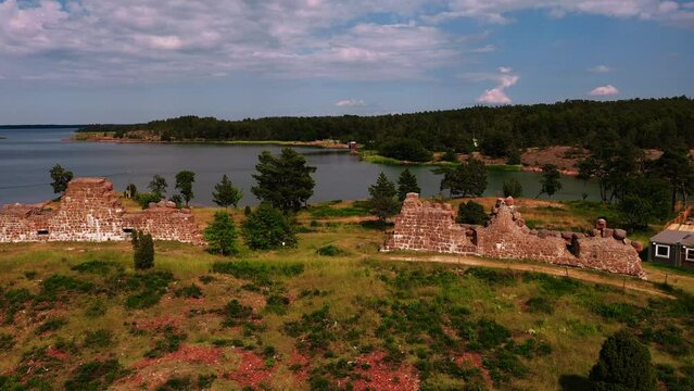 Aerial view of the walls at the Bomarsund castle ruins, in Aland, Finland - low, tracking, drone shot
