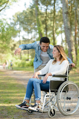 woman with frirn in a wheelchair