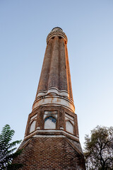 The Yivli Minare Mosque in Antalya, Turkish architecture. Cylindrical minaret decorated with geometric patterns and calligraphy. A popular tourist destination mosque in Antalya. Selective focus