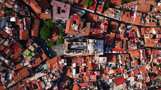 Church of Santa Prisca de Taxco, in Mexico - descending, overhead, aerial view