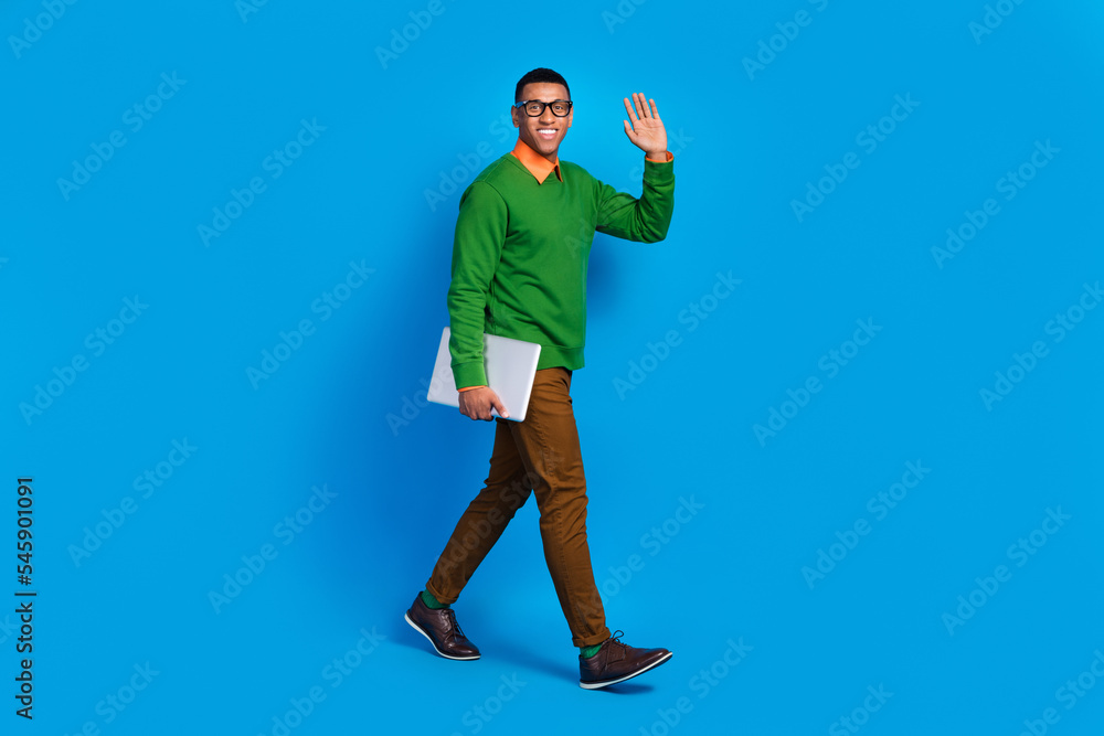 Aufkleber full body length photo of positive professional it coder student guy walking hold his netbook wave h