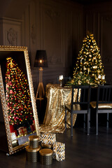 Interior of luxury dark living room decorated with Christmas tree and gifts