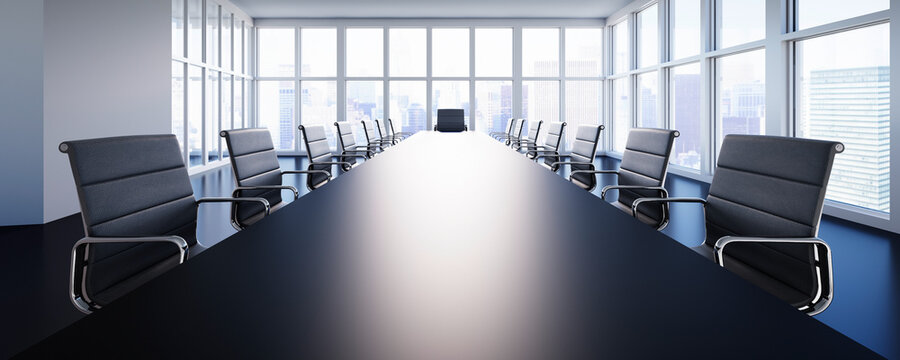 Meeting Room with large table and black chairs