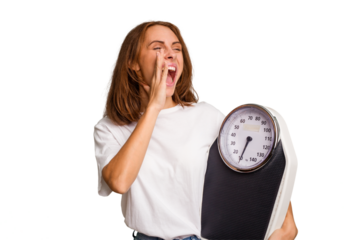 Young caucasian woman holding a scale and measure tape isolated shouting and holding palm near opened mouth.