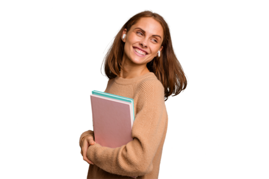 Young student woman holding a books isolated looks aside smiling, cheerful and pleasant.