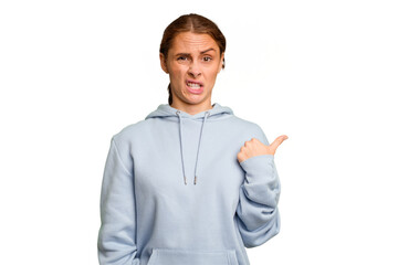 Young caucasian woman isolated shocked pointing with index fingers to a copy space.