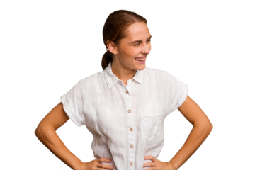 Young caucasian woman isolated laughs happily and has fun keeping hands on stomach.