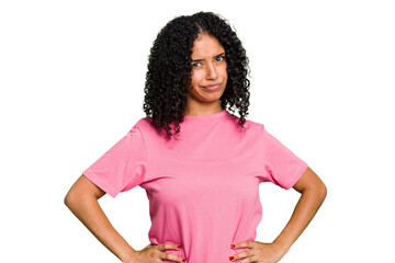 Young cute brazilian woman isolated frowning face in displeasure, keeps arms folded.