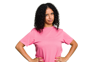 Young cute brazilian woman isolated frowning face in displeasure, keeps arms folded.