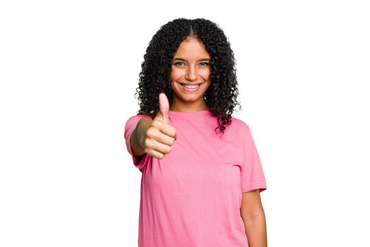 Young cute brazilian woman isolated smiling and raising thumb up