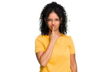 Young cute brazilian woman isolated thinking and looking up, being reflective, contemplating, having a fantasy.