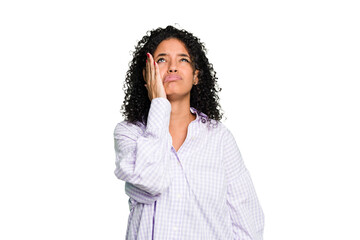 Young cute brazilian woman isolated tired and very sleepy keeping hand on head.