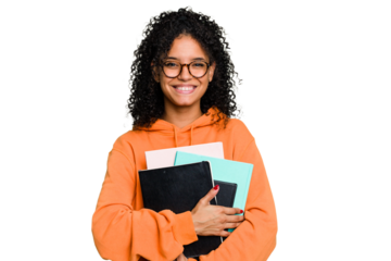 Young African american student woman holding a lot of books isolated