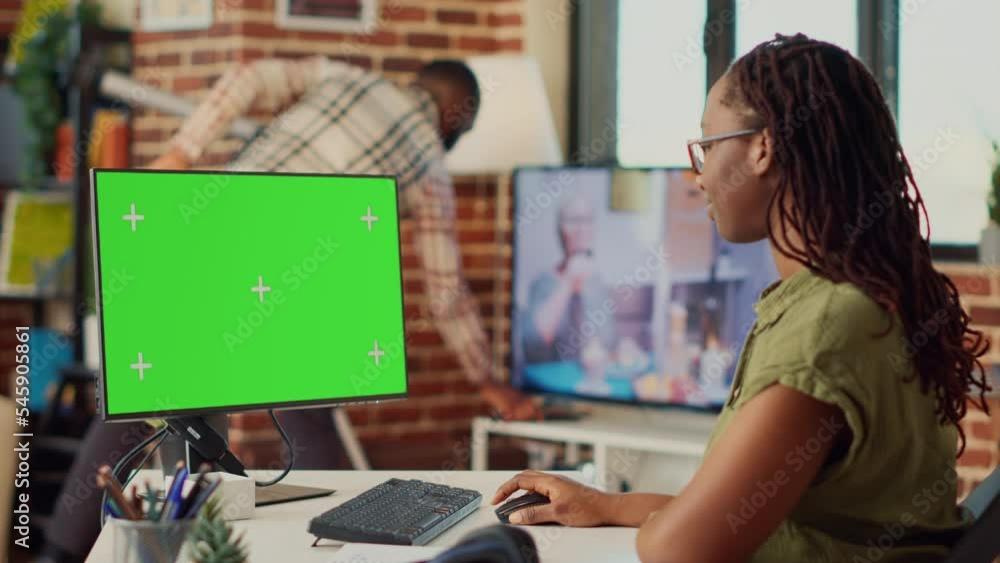 Aufkleber corporate worker looking at greenscreen display on computer, working remotely from home with isolate