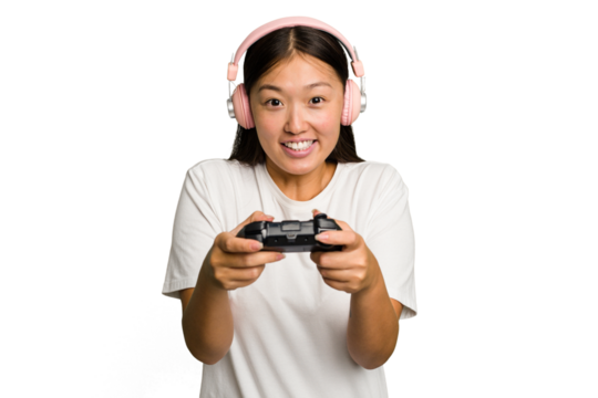 Young asian gamer woman playing with a game controller and headphones isolated
