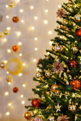 decorated christmas tree over background with led lights