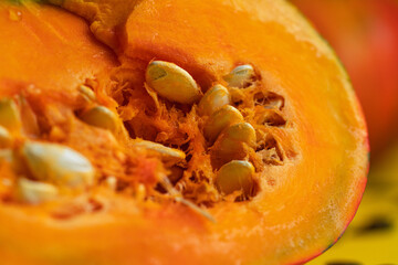 macro cut pumpkin with seeds
