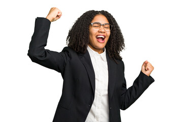 Young african american business woman isolated raising fist after a victory, winner concept.