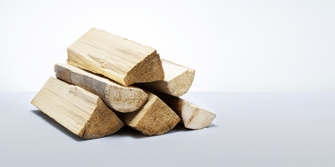  stack of firewood for  heating houses, banner with copy space.