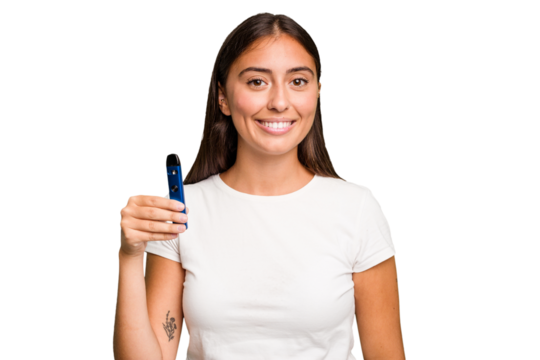 Young caucasian woman holding a electronic cigarette happy, smiling and cheerful.