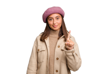 Young caucasian woman wearing winter jacket isolated showing number one with finger.