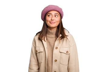 Fototapeta premium Young caucasian woman wearing winter jacket isolated dreaming of achieving goals and purposes