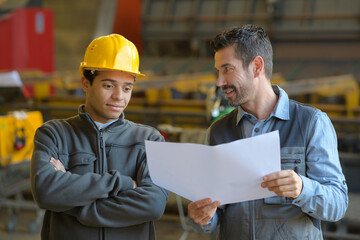 workers and manager at factory