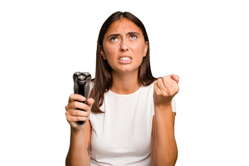 Fototapeta premium Young caucasian woman holding a razor isolated