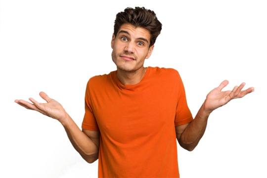 Young caucasian handsome man isolated doubting and shrugging shoulders in questioning gesture.