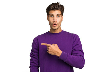 Young caucasian handsome man isolated pointing to the side