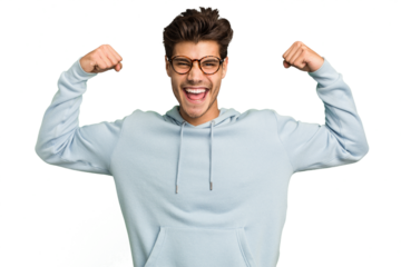 Young caucasian handsome man isolated showing strength gesture with arms, symbol of feminine power