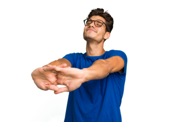 Young caucasian handsome man isolated stretching arms, relaxed position.