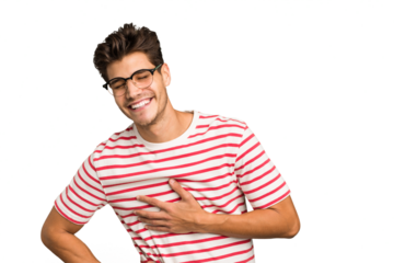 Young caucasian handsome man isolated laughing keeping hands on heart, concept of happiness.