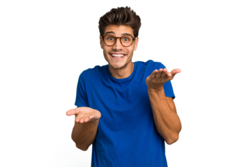 Young caucasian handsome man isolated makes scale with arms, feels happy and confident.