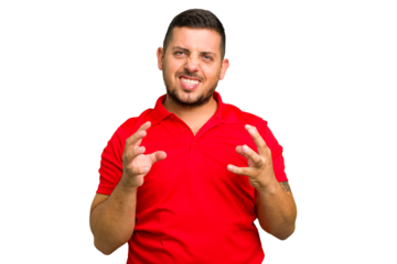 Young caucasian man isolated upset screaming with tense hands.