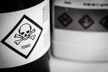 The toxic chemical symbol on the bottle