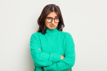 Young Indian woman isolated on white background unhappy looking in camera with sarcastic expression.