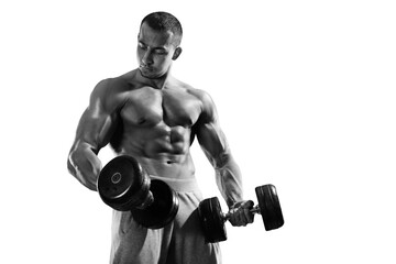 Sport and fitness on transparent background.	Muscular bodybuilder in the gym training with dumbbells. - 545913663