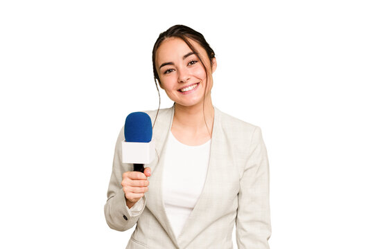 Young TV presenter caucasian woman isolated on green chroma background happy, smiling and cheerful.