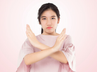asian teenage girls showing prohibit and refuse expectation