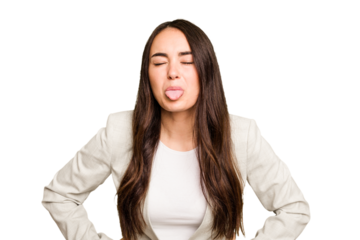 Young caucasian woman isolated on green chroma background funny and friendly sticking out tongue.