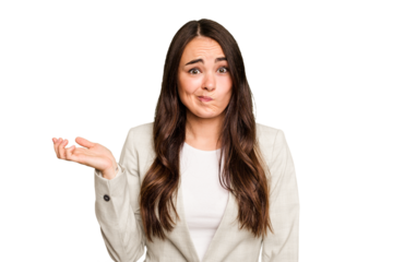 Young caucasian woman isolated on green chroma background doubting and shrugging shoulders in questioning gesture.