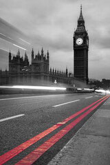Fototapeta na wymiar Big Ben during a evening with lights of cars on the bridge in London, England, United Kingdom