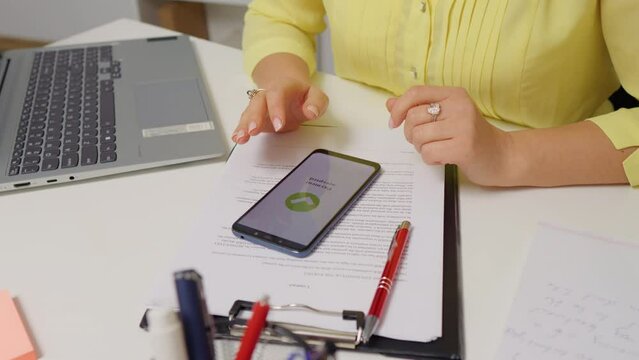 Close-up woman hand use cashless wifi app to buy online. Order and payment online contactless.